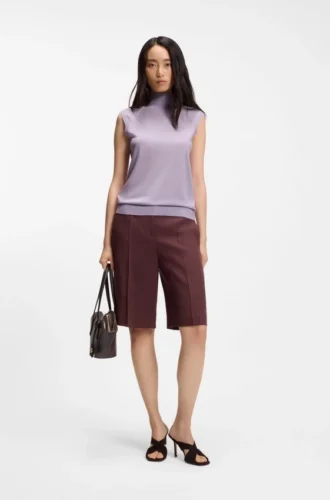 Sleeveless mock-neck sweater in merino wool