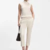 Sleeveless mock-neck sweater in merino wool