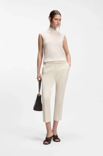 Sleeveless mock-neck sweater in merino wool