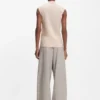 Sleeveless mock-neck sweater in merino wool