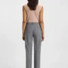 Sleeveless mock-neck sweater in merino wool