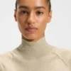 Sleeveless mock-neck sweater in merino wool