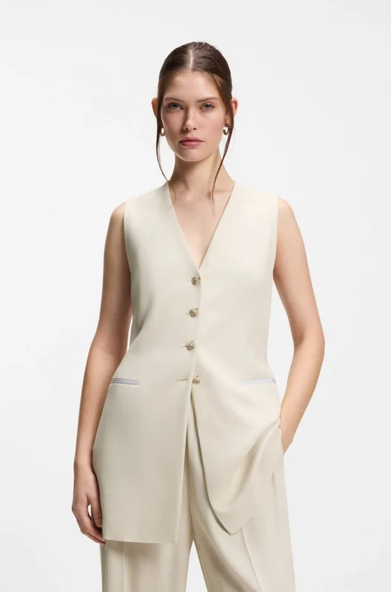 Slim-fit blazer with sleeveless styling Slim-fit blazer with sleeveless styling