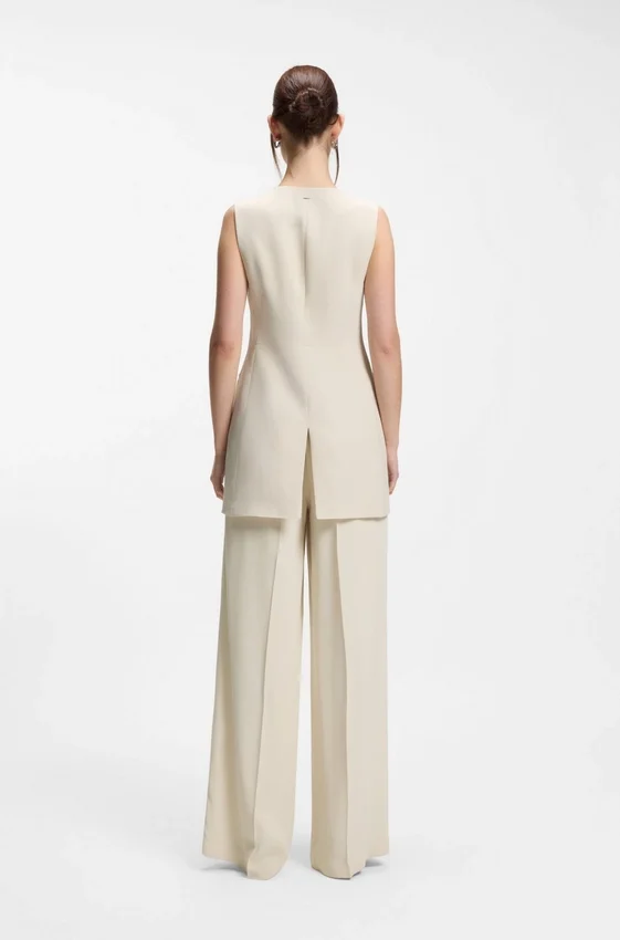 Slim-fit blazer with sleeveless styling Slim-fit blazer with sleeveless styling