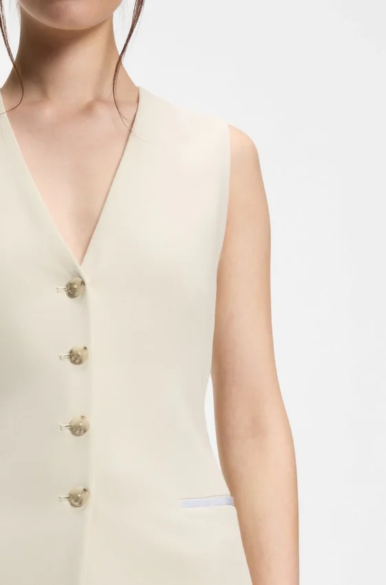 Slim-fit blazer with sleeveless styling Slim-fit blazer with sleeveless styling