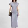 Slim-fit blouse with draped neckline Slim-fit blouse with draped neckline