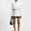 Slim-fit blouse with faux-leather belt Slim-fit blouse with faux-leather belt