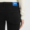Slim-fit jeans with rhinestone logos