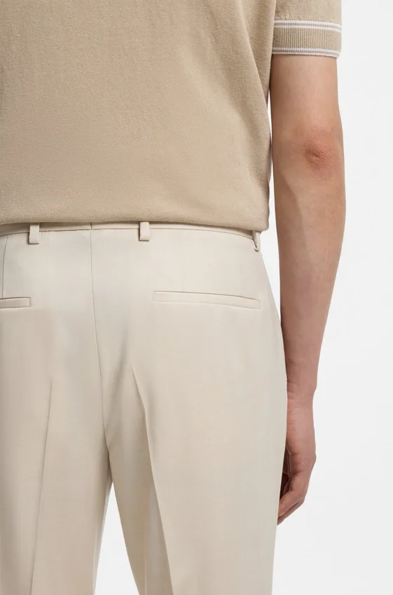Slim-fit pants in virgin-wool serge Slim-fit pants in virgin-wool serge