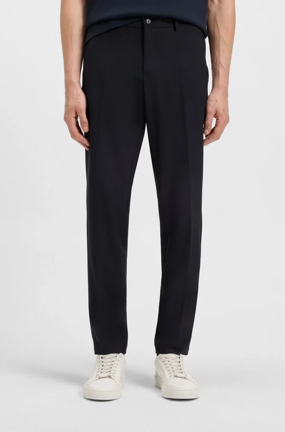 Slim-fit trousers in micro-patterned stretch fabric Slim-fit trousers in micro-patterned stretch fabric