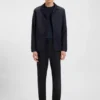 Slim-fit trousers in micro-patterned stretch fabric Slim-fit trousers in micro-patterned stretch fabric