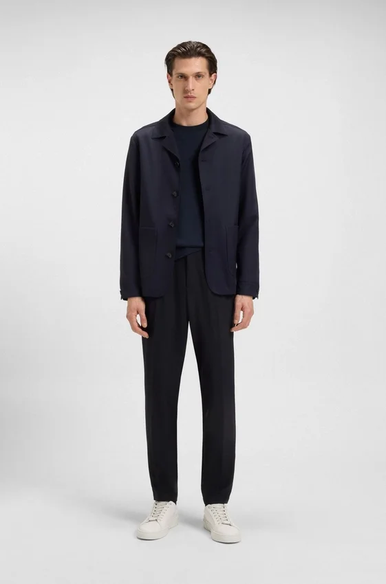 Slim-fit trousers in micro-patterned stretch fabric Slim-fit trousers in micro-patterned stretch fabric