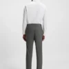 Slim-fit trousers in micro-patterned stretch fabric Slim-fit trousers in micro-patterned stretch fabric