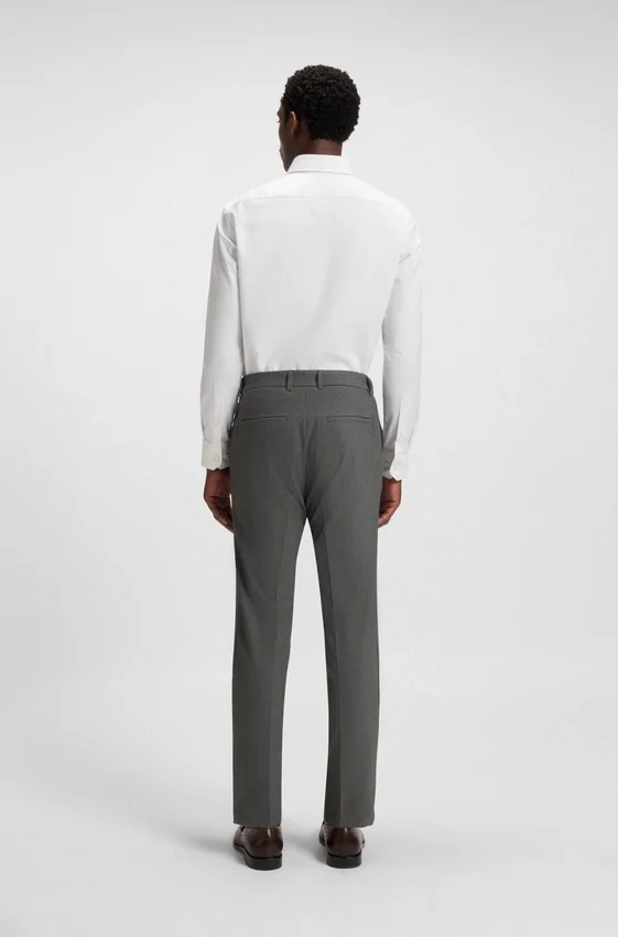 Slim-fit trousers in micro-patterned stretch fabric Slim-fit trousers in micro-patterned stretch fabric
