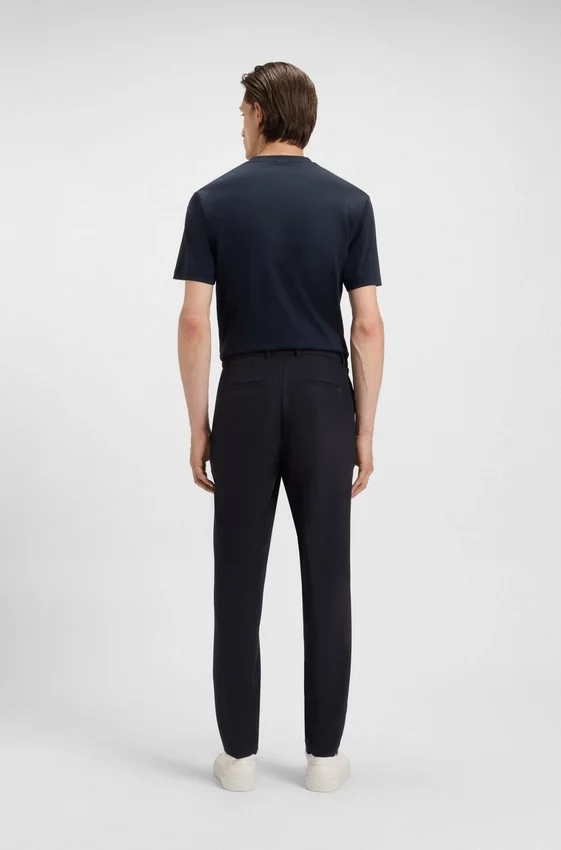 Slim-fit trousers in micro-patterned stretch fabric Slim-fit trousers in micro-patterned stretch fabric