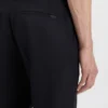 Slim-fit trousers in micro-patterned stretch fabric Slim-fit trousers in micro-patterned stretch fabric
