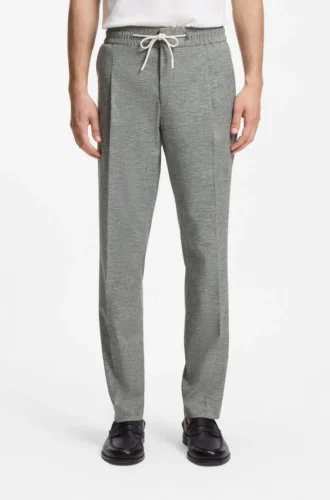 Slim-fit trousers in performance sharkskin