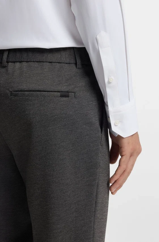 Slim-fit trousers in performance-stretch fabric Slim-fit trousers in performance-stretch fabric
