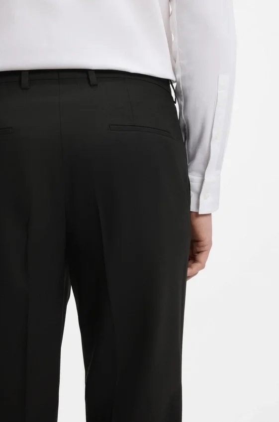 Slim-fit trousers in wool-blend poplin Slim-fit trousers in wool-blend poplin