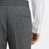 Slim-fit trousers in wool-blend sharkskin