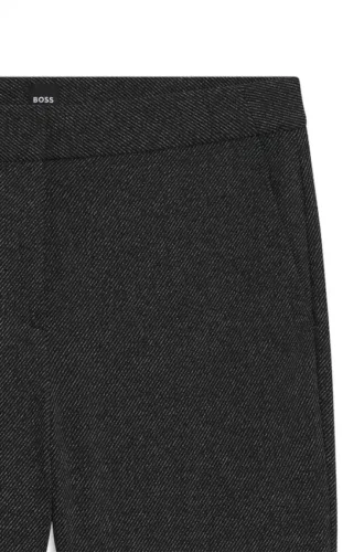 Slim-fit trousers with flared leg