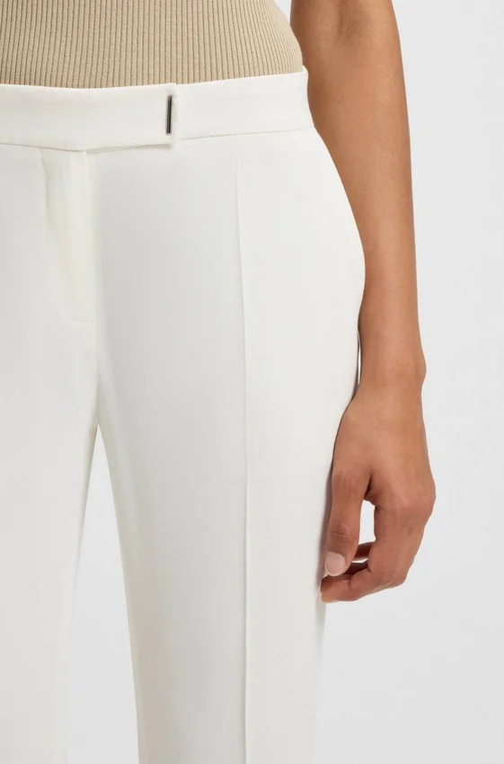 Slim-fit trousers with hem slits Slim-fit trousers with hem slits