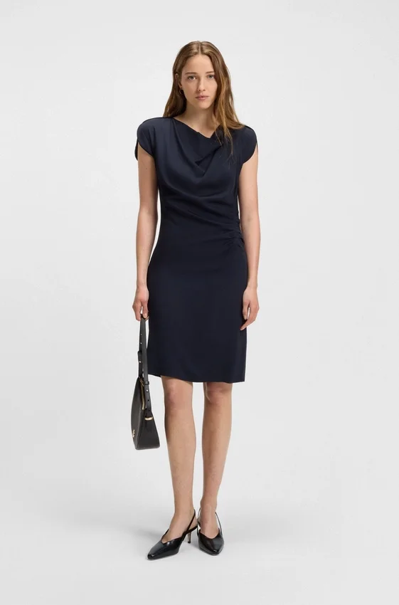 Slingback pumps in polished leather Slingback pumps in polished leather