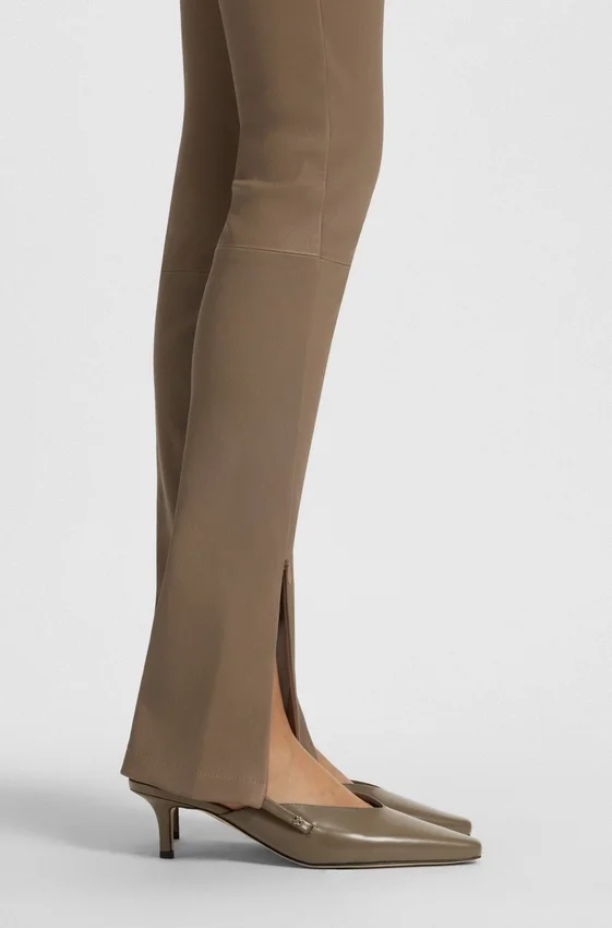 Slingback pumps in polished leather Slingback pumps in polished leather