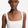Square-neck dress with golden chain belt Square-neck dress with golden chain belt