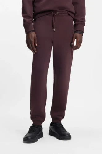 Stacked-logo tracksuit bottoms in a cotton blend Stacked-logo tracksuit bottoms in a cotton blend