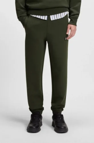 Stacked-logo tracksuit bottoms in a cotton blend Stacked-logo tracksuit bottoms in a cotton blend