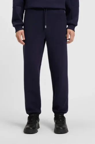 Stacked-logo tracksuit bottoms in a cotton blend Stacked-logo tracksuit bottoms in a cotton blend