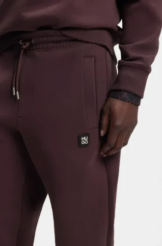 Stacked-logo tracksuit bottoms in a cotton blend Stacked-logo tracksuit bottoms in a cotton blend