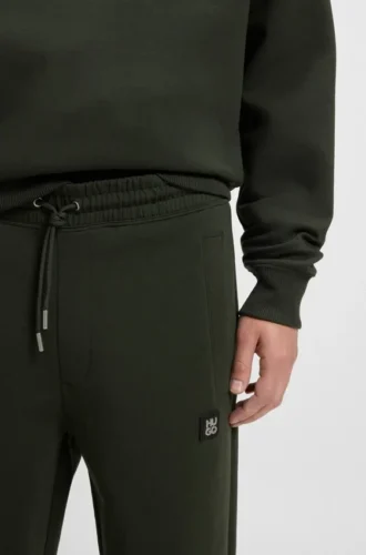 Stacked-logo tracksuit bottoms in a cotton blend Stacked-logo tracksuit bottoms in a cotton blend