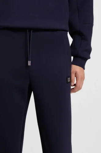 Stacked-logo tracksuit bottoms in a cotton blend Stacked-logo tracksuit bottoms in a cotton blend