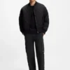 Straight-fit cargo trousers in waxed fabric Straight-fit cargo trousers in waxed fabric