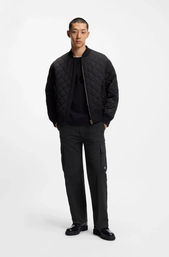 Straight-fit cargo trousers in waxed fabric Straight-fit cargo trousers in waxed fabric
