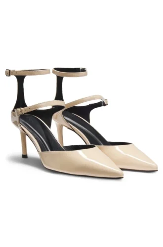 Strap-detail pumps in patent leather