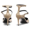 Strap-detail pumps in patent leather