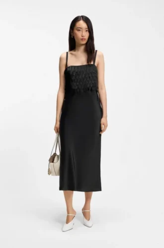 Strappy dress with laser-cut shapes