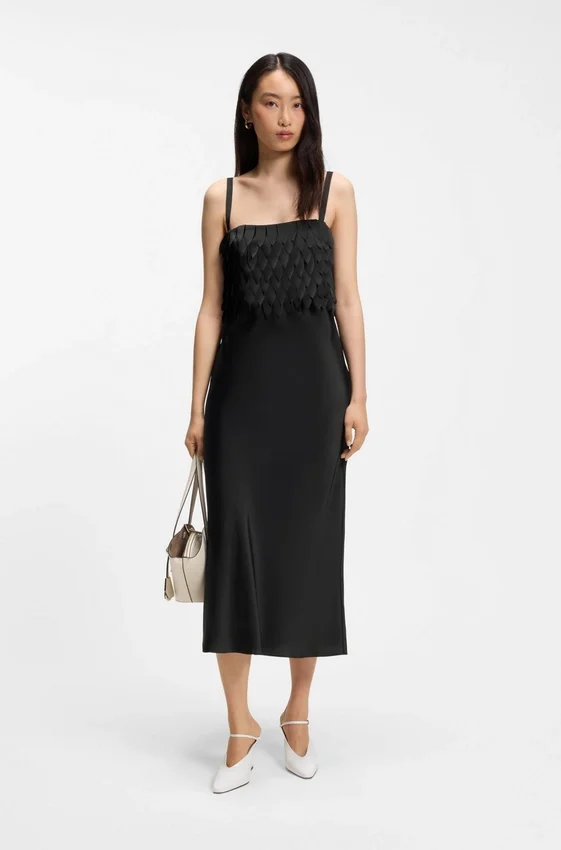 Strappy dress with laser-cut shapes Strappy dress with laser-cut shapes