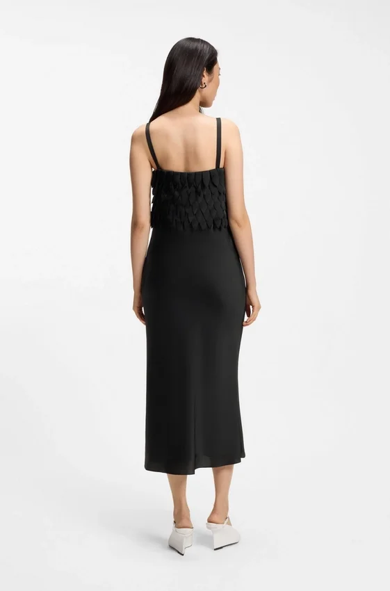 Strappy dress with laser-cut shapes Strappy dress with laser-cut shapes