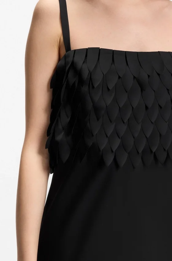 Strappy dress with laser-cut shapes Strappy dress with laser-cut shapes
