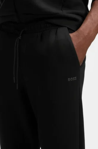 Stretch-cotton track pants with logo print
