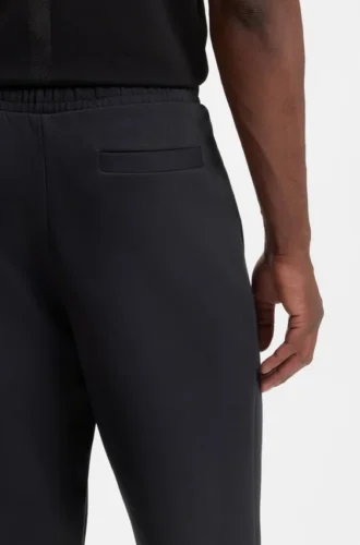 Stretch-cotton track pants with logo print