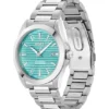 STRIKE Silver-tone watch with grooved turquoise dial