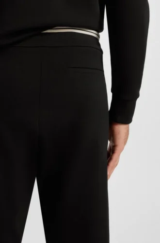 Stripe-detail tracksuit bottoms in a cotton blend Stripe-detail tracksuit bottoms in a cotton blend
