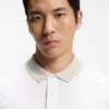 Stripe-trim slim-fit polo shirt in mercerised cotton Stripe-trim slim-fit polo shirt in mercerised cotton