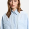 Striped relaxed-fit blouse in cotton poplin Striped relaxed-fit blouse in cotton poplin