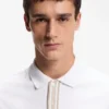 Striped-trim polo shirt in mercerised cotton Striped-trim polo shirt in mercerised cotton